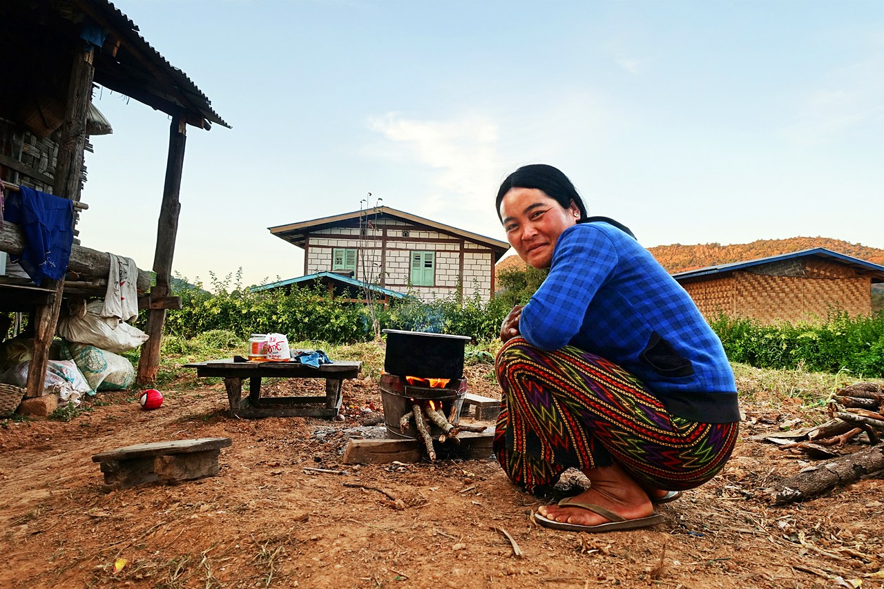 Homestay host preparing our dinner
