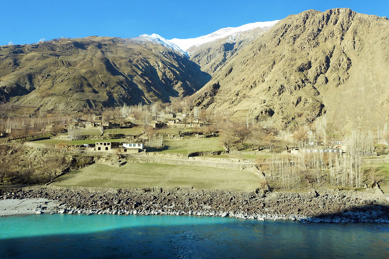 An Afghan village seen from the Tajik side of the Panj river