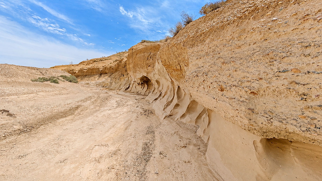 Walking along the dry, gravelly riverbed