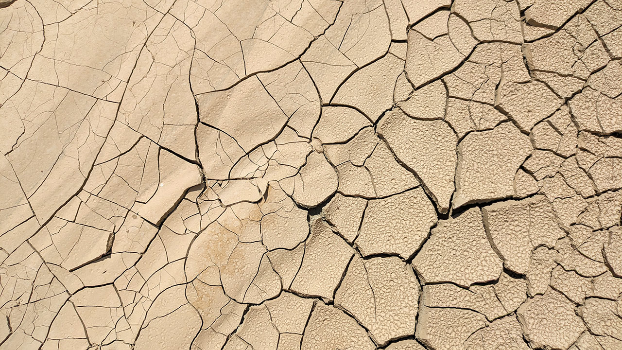 Walking along the dry, gravelly riverbed