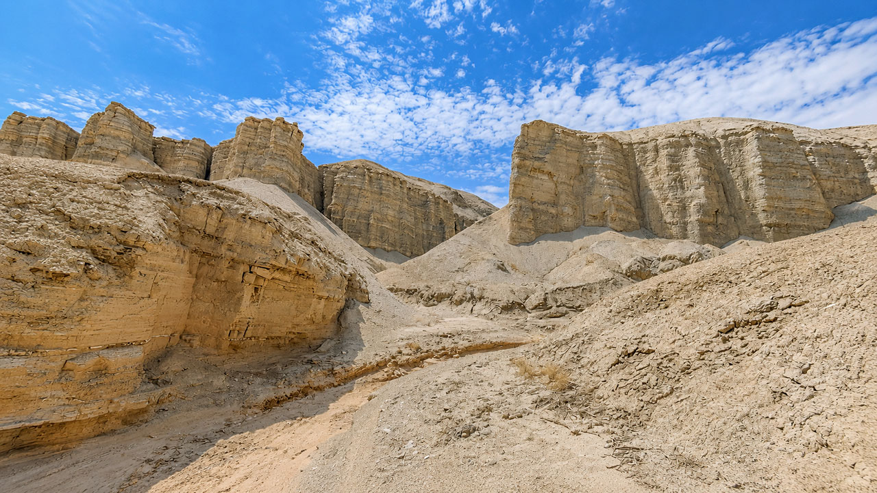 Walking along the dry, gravelly riverbed